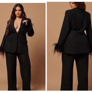 2 piece black, blazer and wide leg pant suit. New, never worn.